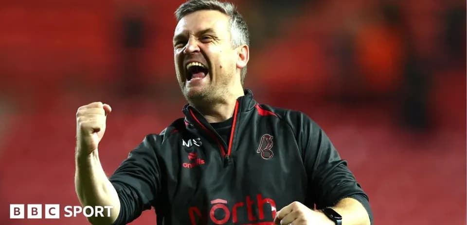 Coach celebrating passionately after match victory