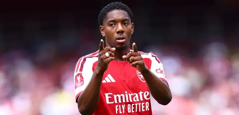 Player celebrating with fingers pointed during match