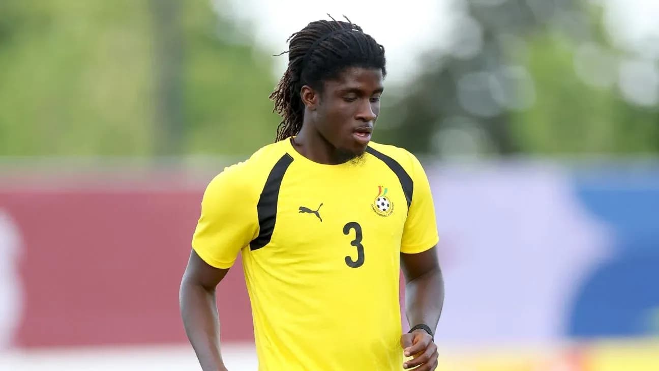 Player in yellow jersey jogging during training session