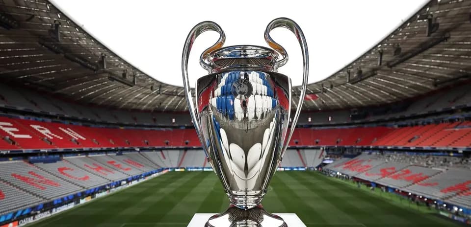 Champions League trophy displayed in stadium