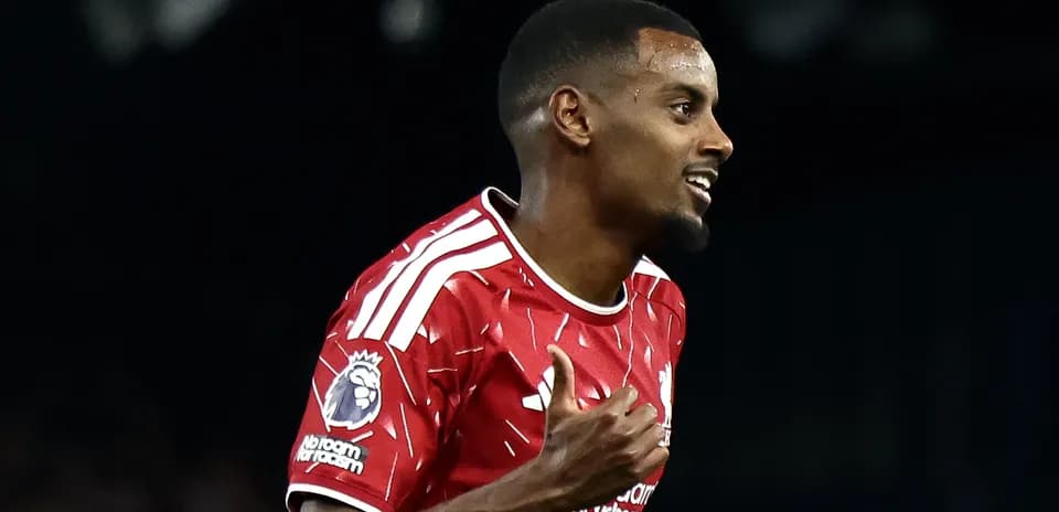 Player celebrating a goal in Liverpool kit