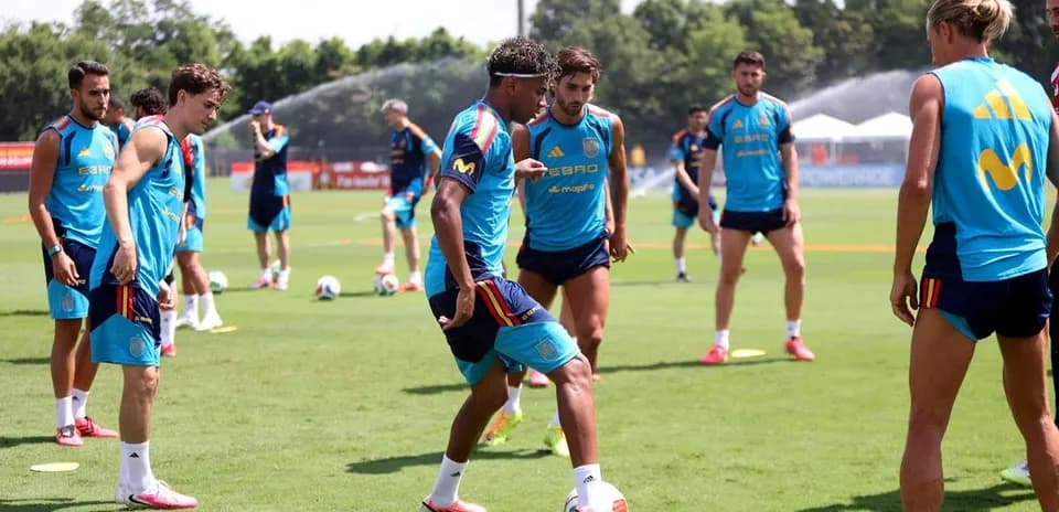 Spain national team training session on grass pitch