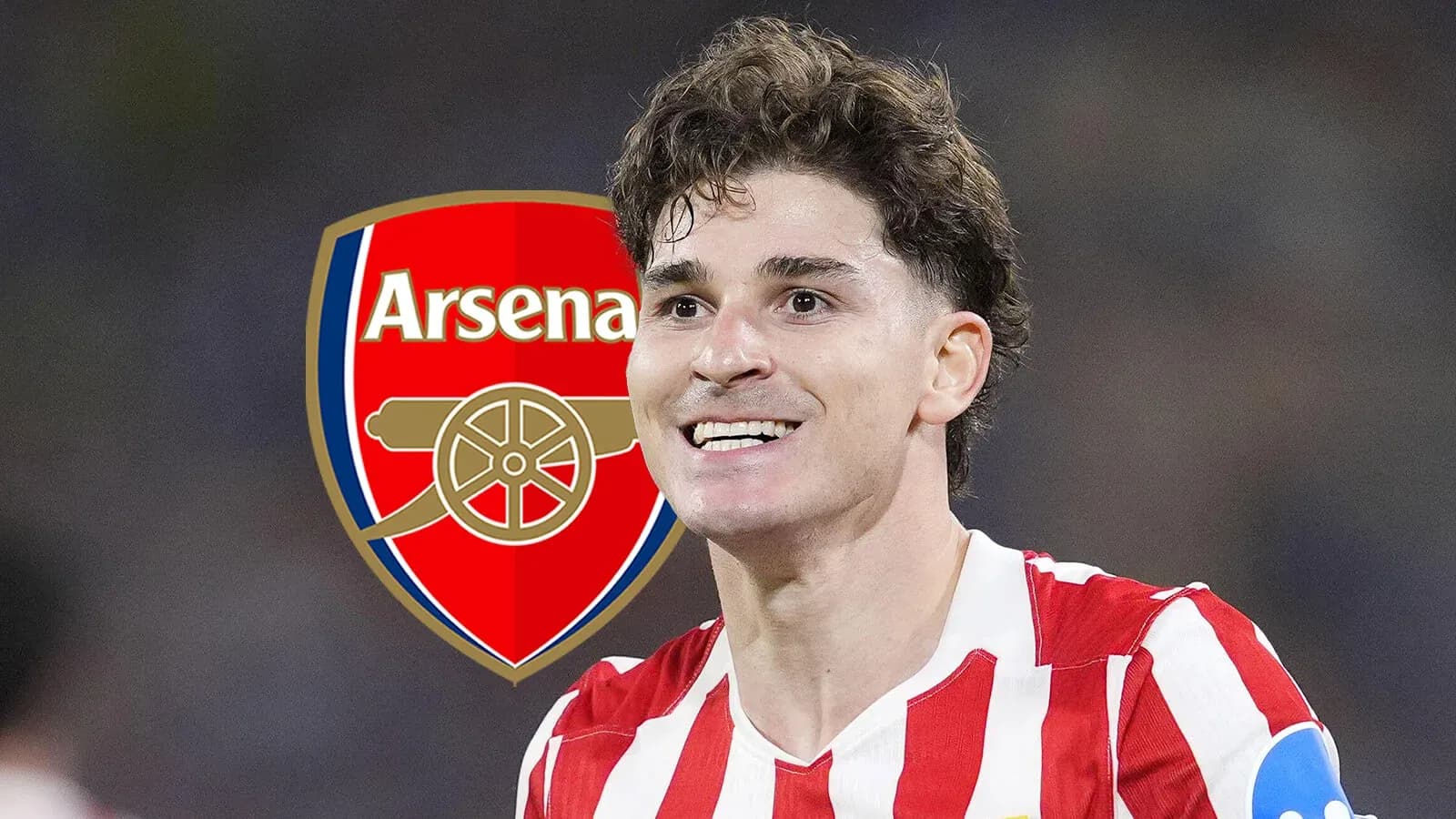 Player celebrating with Arsenal logo in background