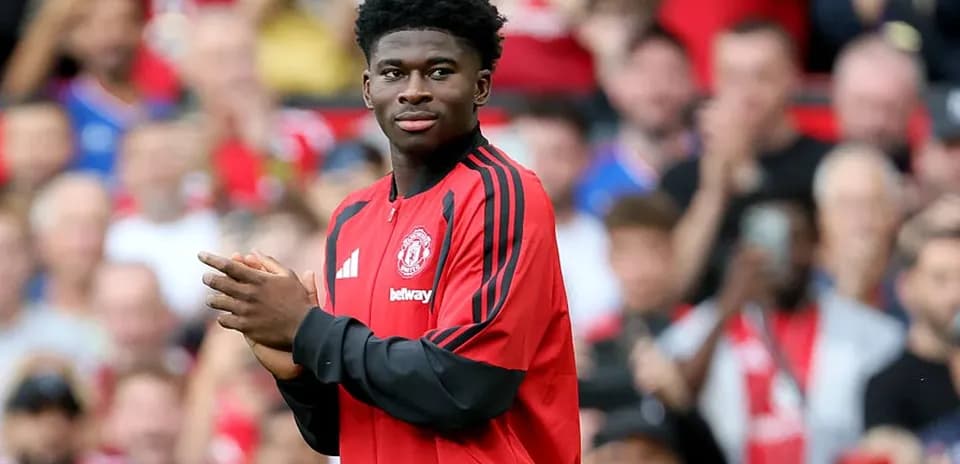 Player applauding during Manchester United match warm-up
