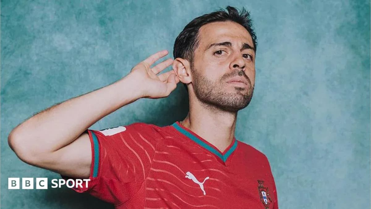 Player posing in Portugal national team jersey