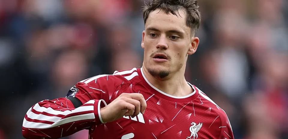 Player in Liverpool jersey during match action
