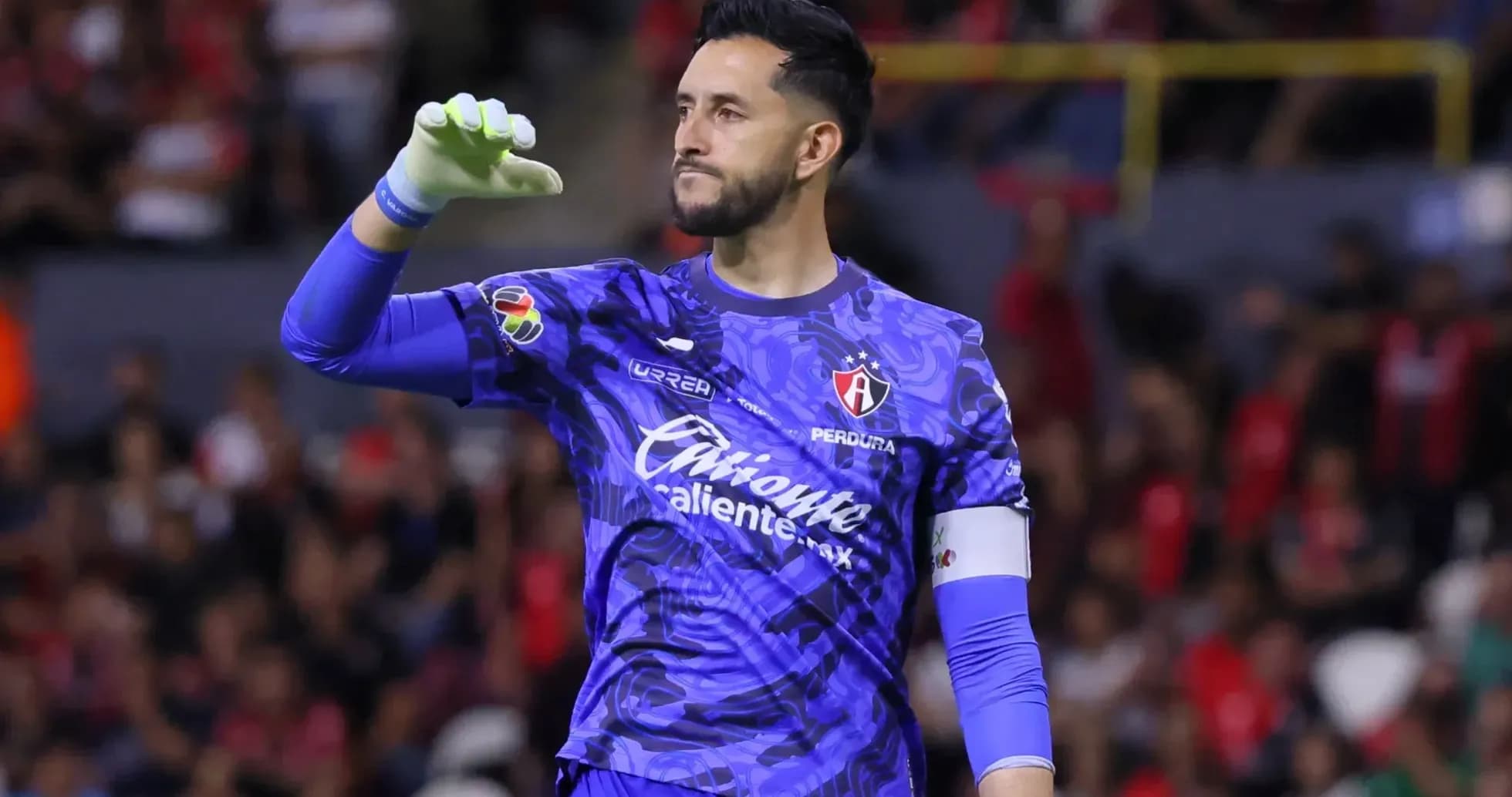 Atlas goalkeeper celebrating during Liga MX match