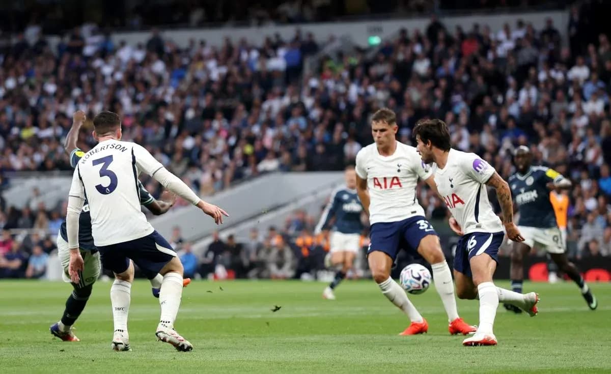 Tottenham players defending during a match action