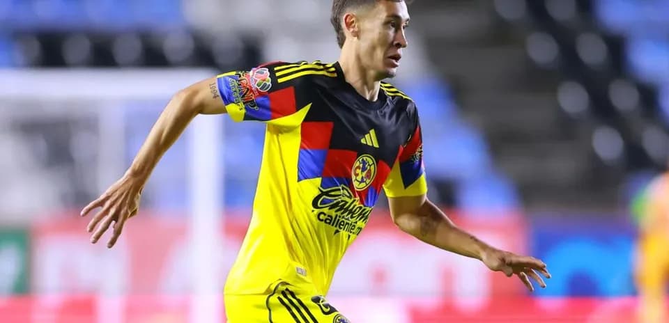 Club America player running during Liga MX match