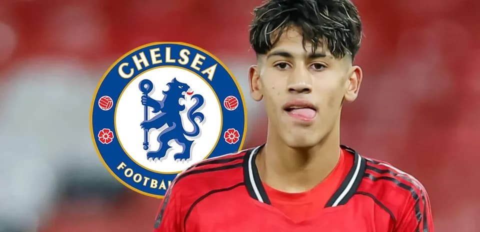 Young player wearing Manchester United kit with Chelsea logo