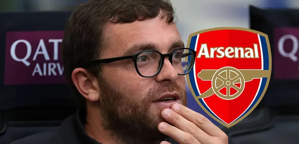 Person with glasses in front of Arsenal logo