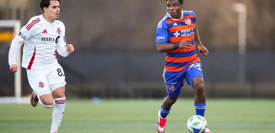 Player dribbling the ball during FC Cincinnati II match