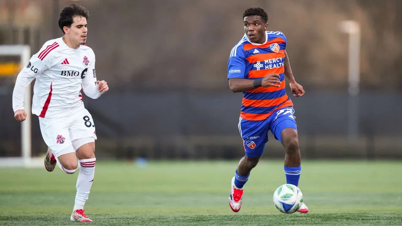 Player dribbling the ball during FC Cincinnati II match