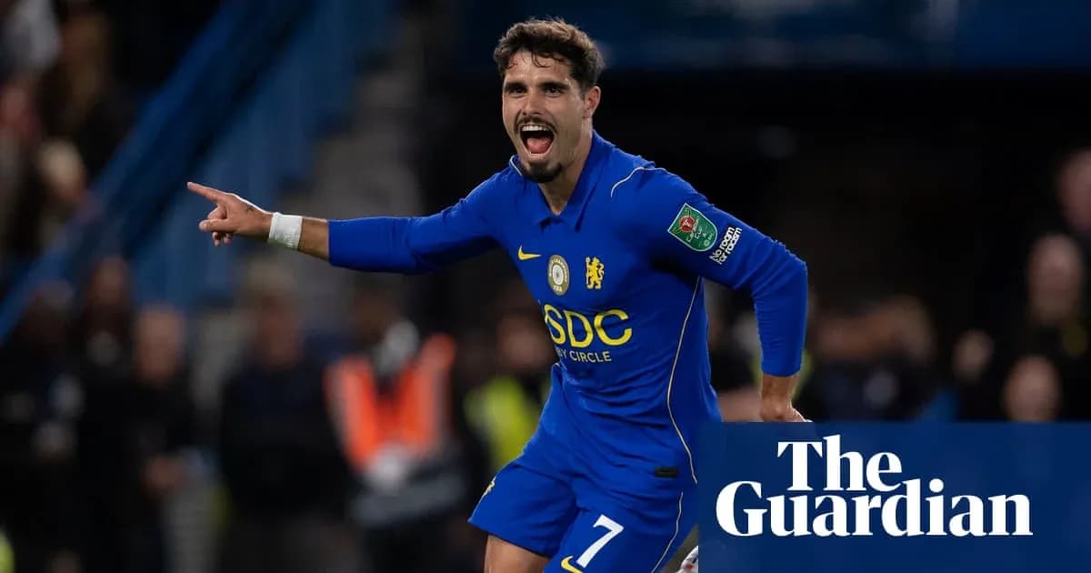 Player celebrating goal in Chelsea's blue kit Player celebrating goal in Chelsea's blue kit