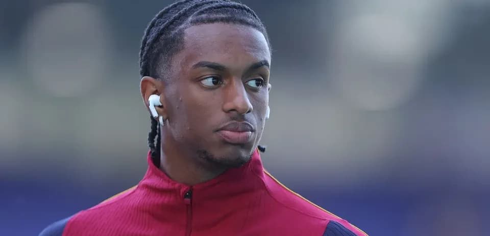Player wearing earbuds before the match