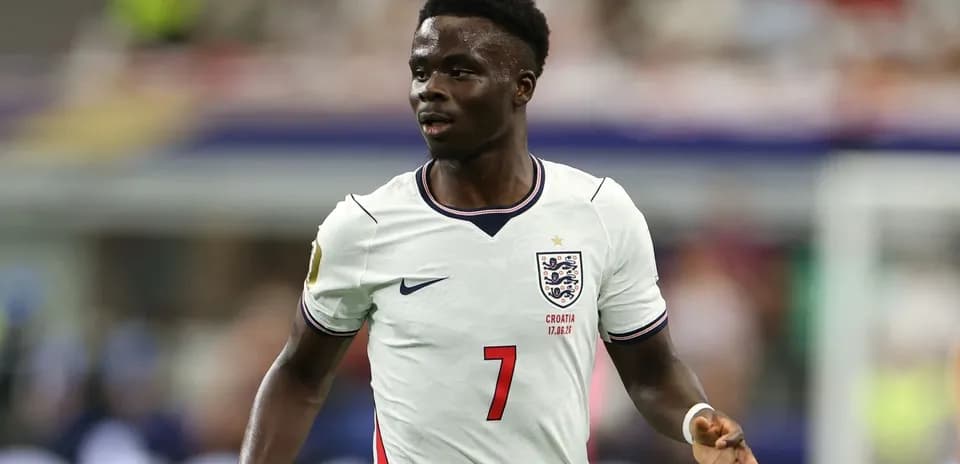 Player in England kit during football match