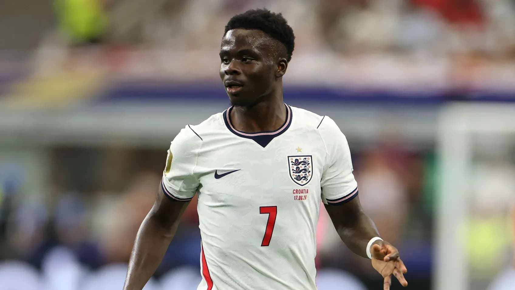 Player in England kit during football match