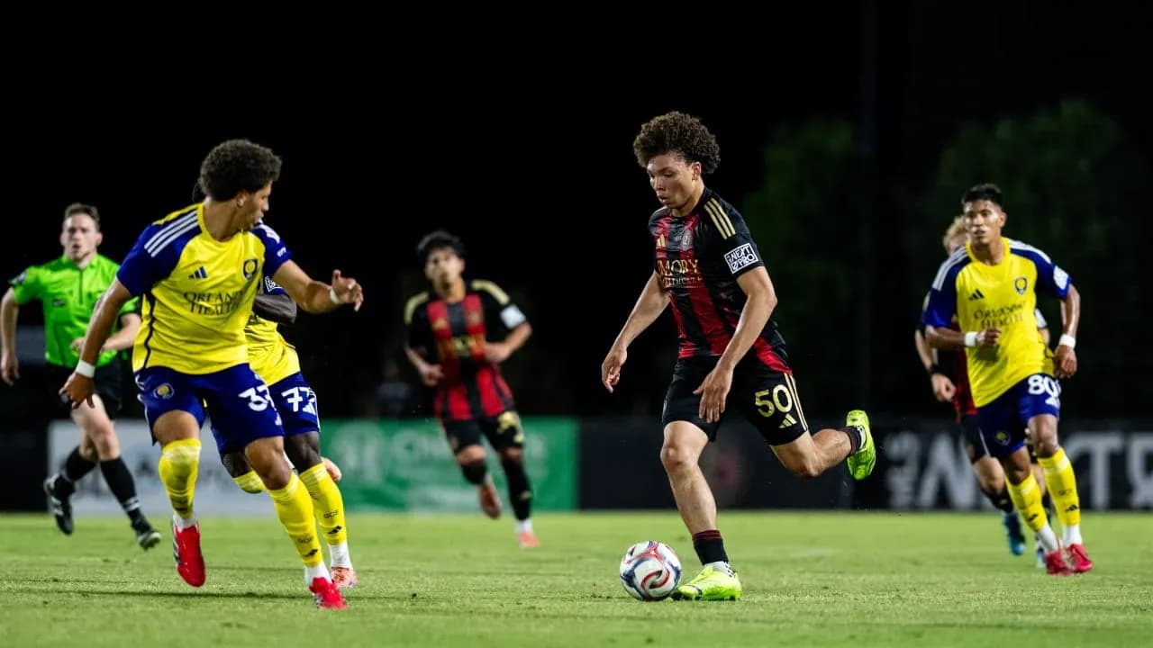 Atlanta United II player dribbling past Orlando City II