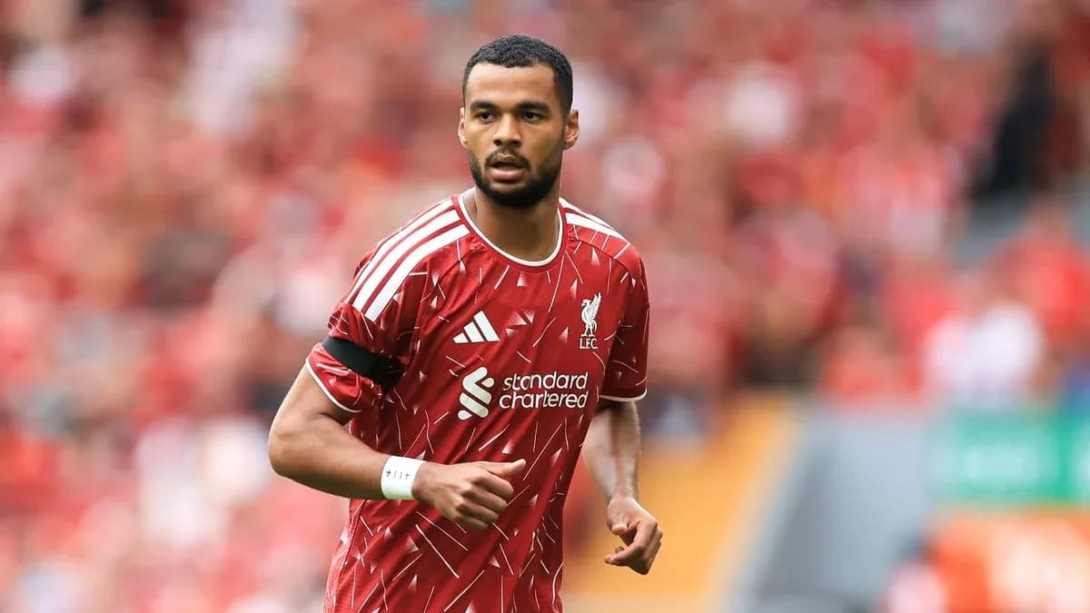 Player in Liverpool kit during match warm-up
