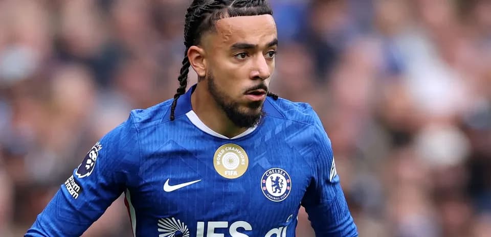 Player wearing Chelsea jersey during match action
