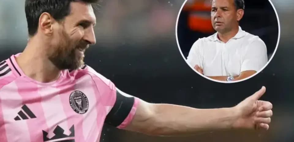 Lionel Messi celebrating during a match with coach in background