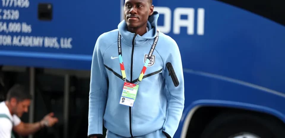 Player arriving at the team bus before match