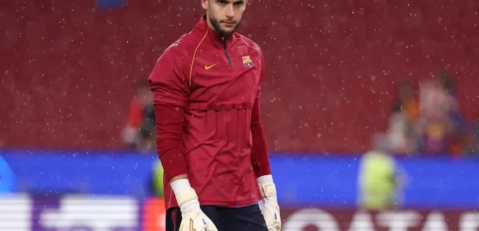 Goalkeeper training in rain before the match