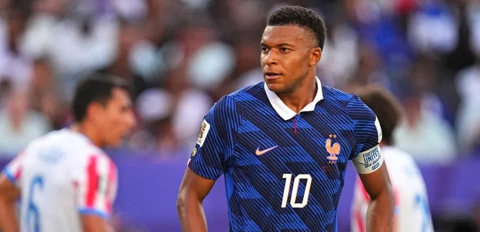 Kylian Mbappé in France kit during match