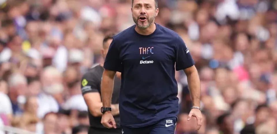 Manager directing players during a match