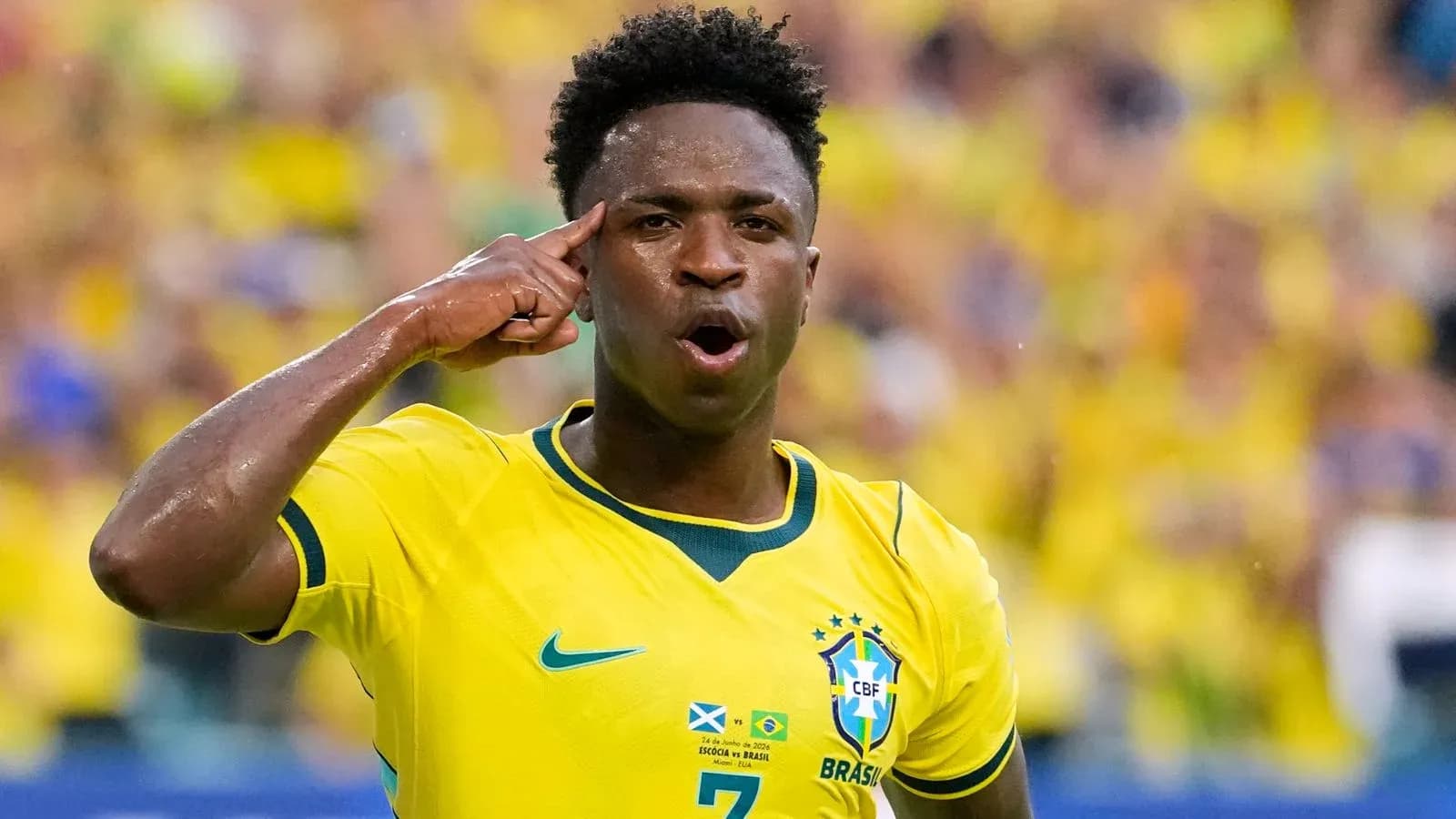 Player celebrating in Brazil national team jersey