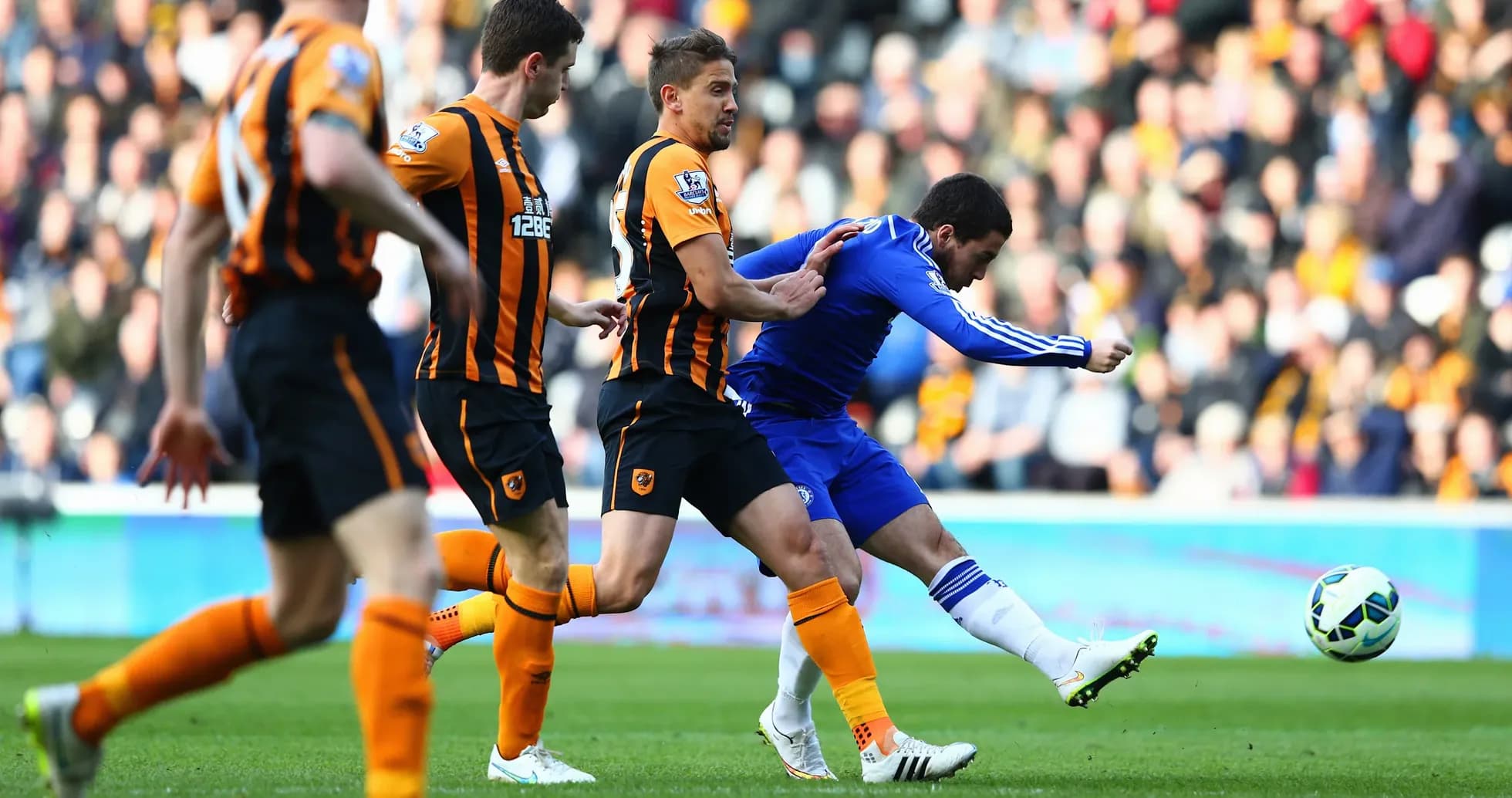 Chelsea player kicking the ball against Hull City