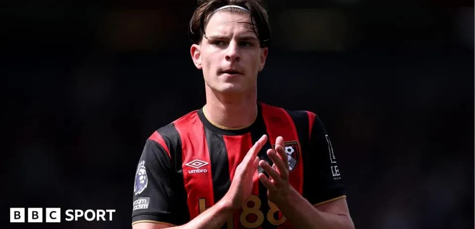 Bournemouth player applauding fans after match