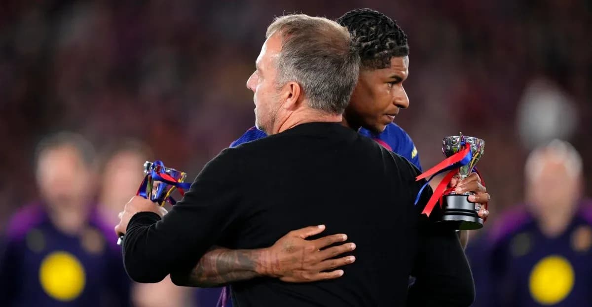 Player receiving award and hugging coach on field