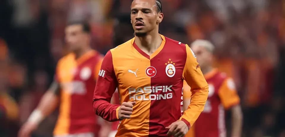 Player wearing Galatasaray jersey on the field