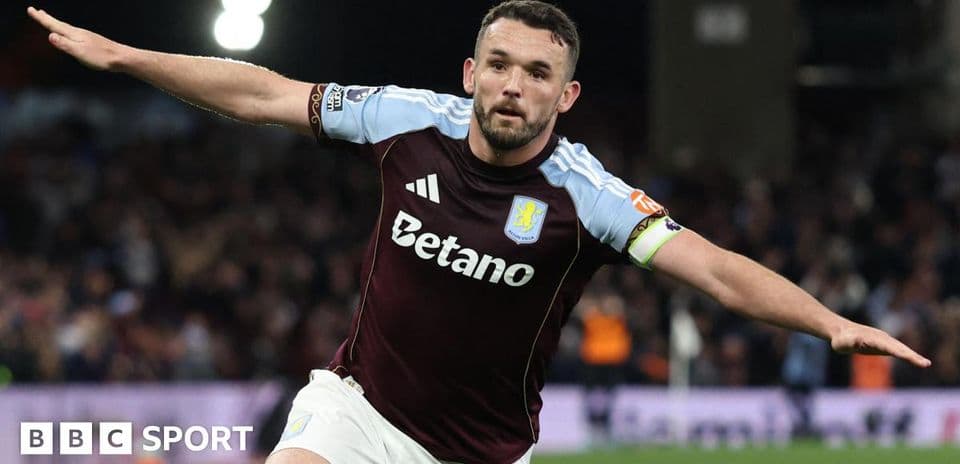 Aston Villa player celebrating a goal on the pitch