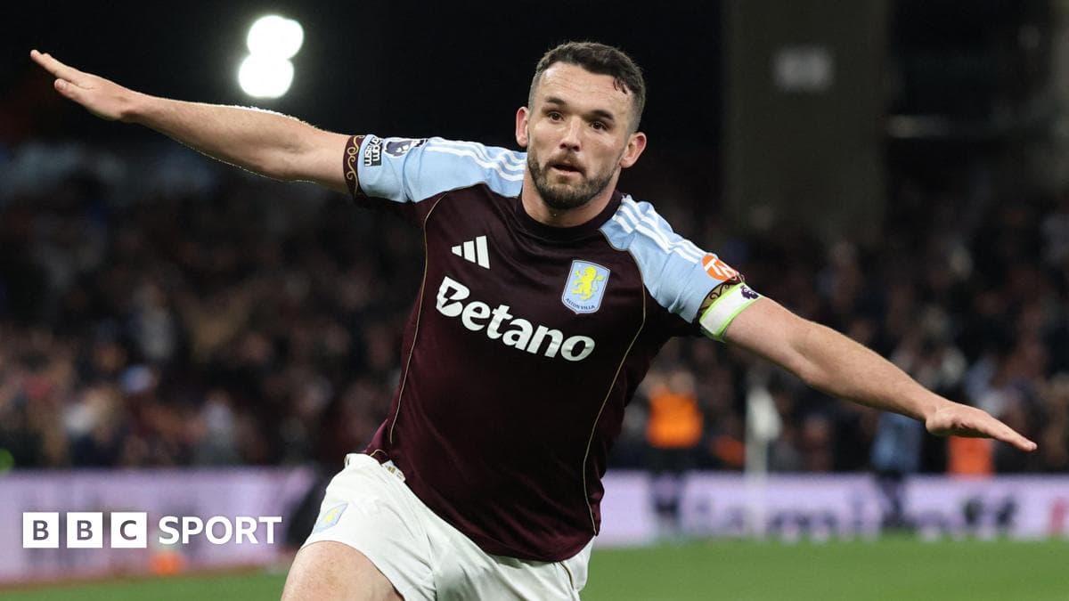 Aston Villa player celebrating a goal on the pitch