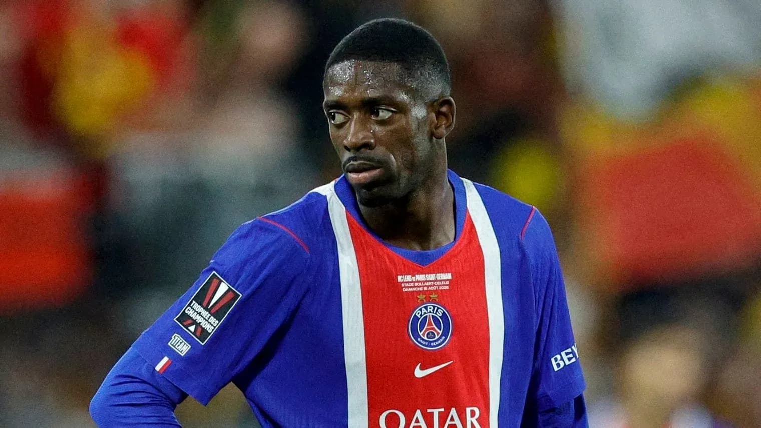 Player wearing PSG jersey during match action