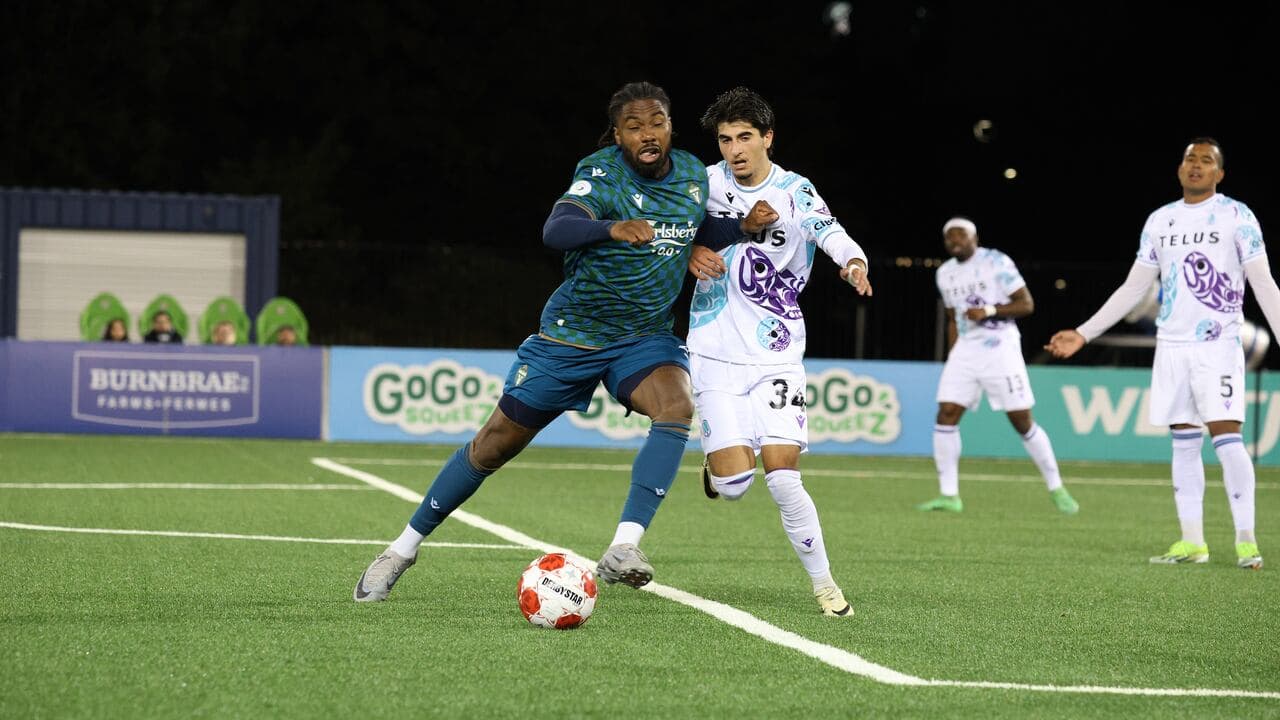 Player dribbling the ball during match action