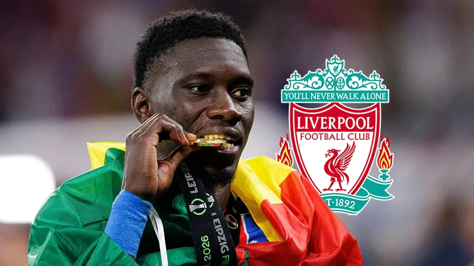 Player holding gold medal wearing national flag
