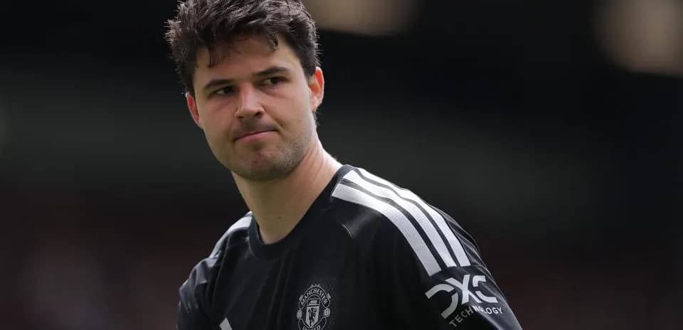 Goalkeeper in Manchester United kit on pitch