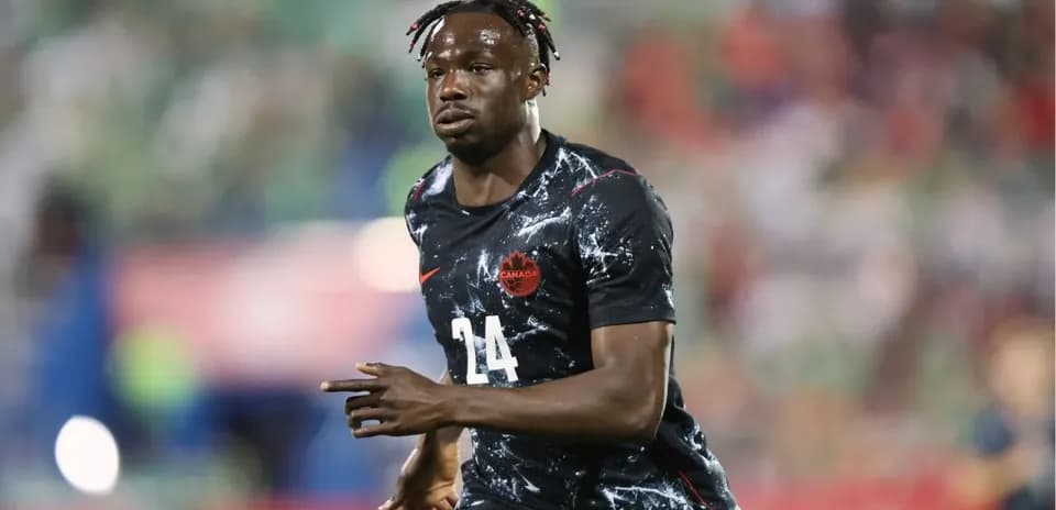Player wearing Canada jersey running on field