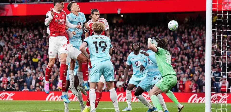 Arsenal player heading the ball against Burnley