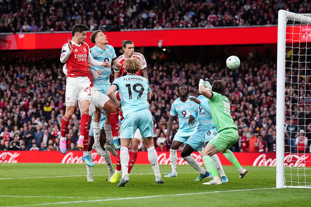 Arsenal player heading the ball against Burnley