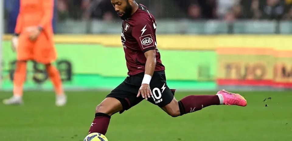 Player kicking the ball during a match