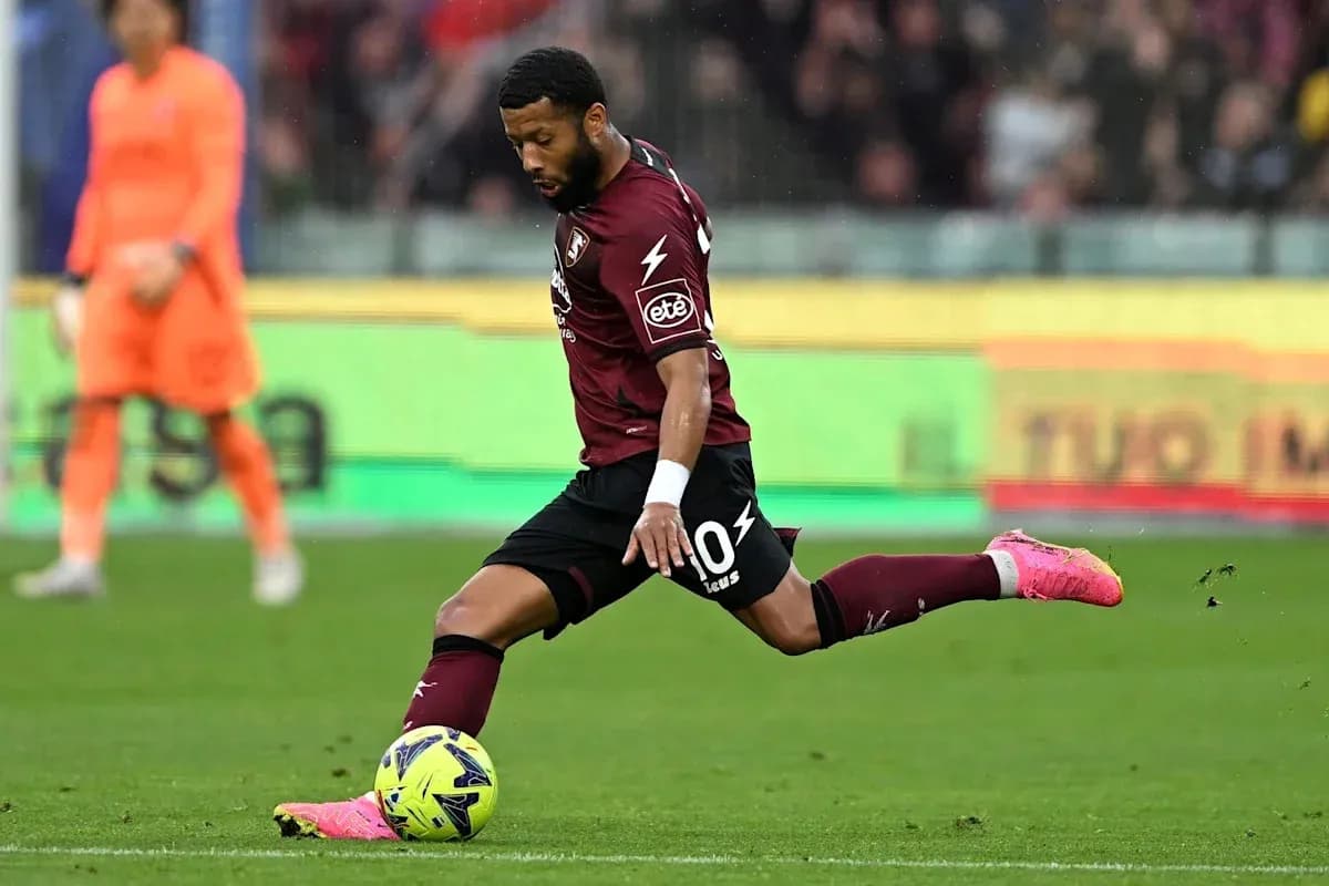 Player kicking the ball during a match