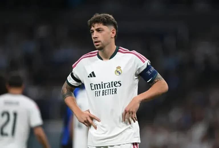 Real Madrid player during a match in white kit