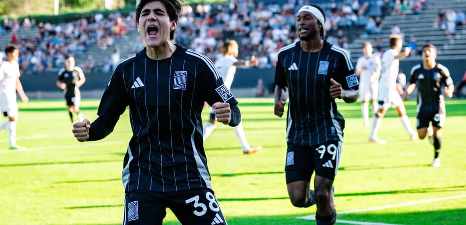 Players celebrating a goal during MLS Next Pro match