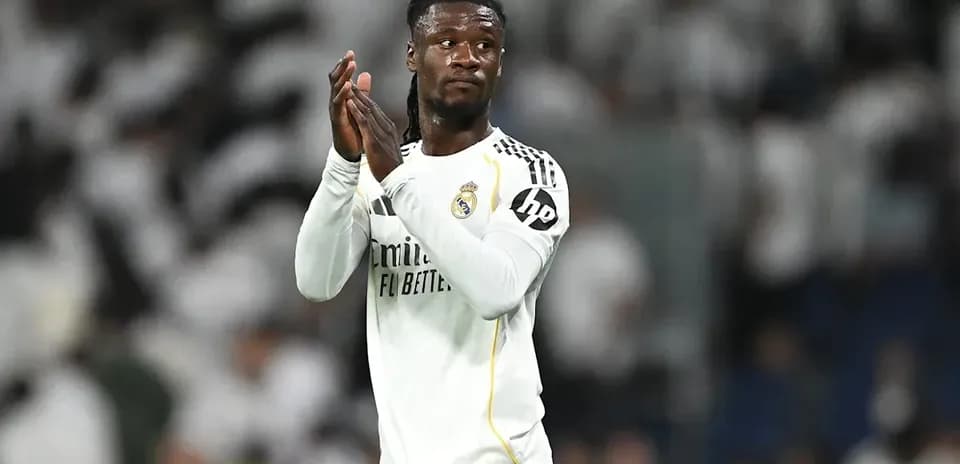 Player applauding fans after a match