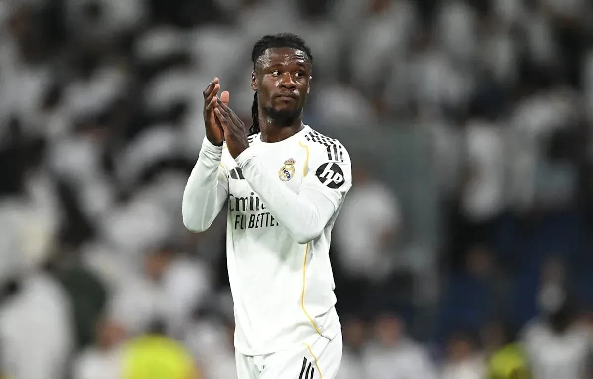 Player applauding fans after a match