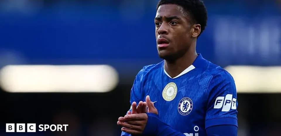 Player in Chelsea kit during match action